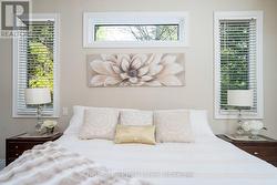 Side transom windows in primary bedroom - 