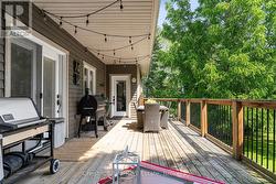 Oversized back deck for cooking and entertaining - 