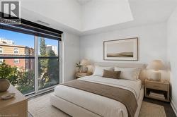 Floor-to-ceiling window with roller shades - 