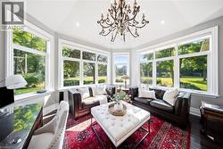 Expansive bay window design with bright white trim and sills - 