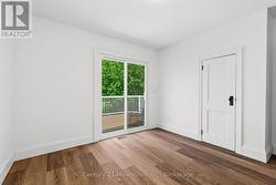 South Bedroom With Deck Access - 