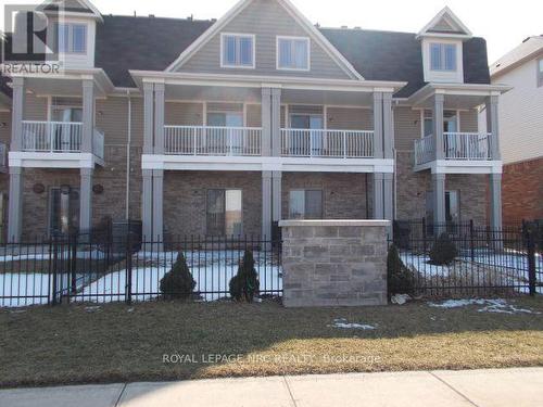 6 - 8 Hemlock Way, Grimsby, ON - Outdoor With Balcony With Facade