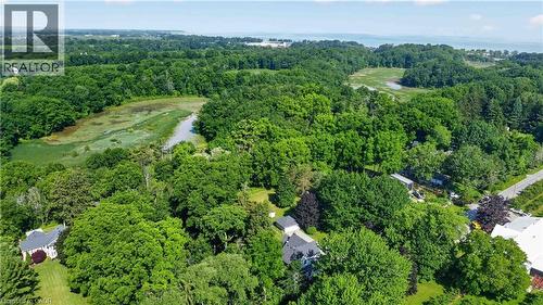 Expansive treed landscape with a visible body of water and distant shoreline - 1629 Gregory Road, St. Catharines, ON 