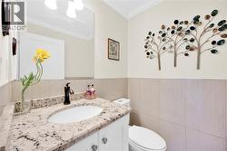Powder room off foyer - 