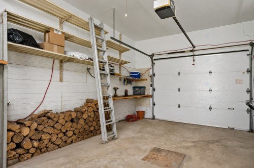 Garage - 130 Ch. Du Lac-Dufour, Mont-Tremblant, QC - Indoor Photo Showing Garage