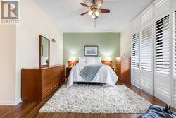 Primary with Walkout to Patio Overlooking Garden - 