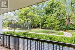 View of Gardens and Tennis Court - 