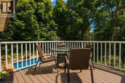 Spacious outdoor deck featuring composite decking and white railing - 355 Edgehill Drive, Kitchener, ON 