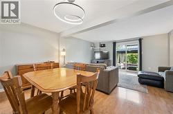Open concept living area featuring light wood-finish flooring - 