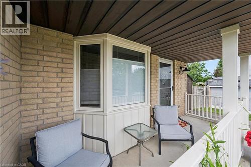 Covered porch featuring a brick exterior and a bay window with white trim - 315 Mayview Crescent Unit# B, Waterloo, ON 