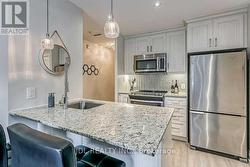 104 - 73 WASHINGTON AVENUE Oakville, ON L6K 1W5