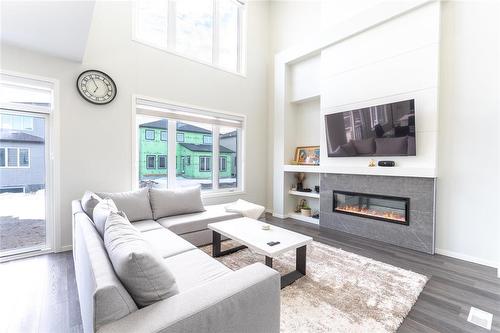 220 North Haven Way, West St Paul, MB - Indoor Photo Showing Living Room With Fireplace