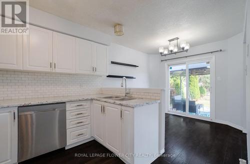 99 Windflower Drive, Kitchener, ON - Indoor Photo Showing Kitchen With Double Sink With Upgraded Kitchen