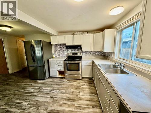832 106 Avenue, Dawson Creek, BC - Indoor Photo Showing Kitchen With Double Sink