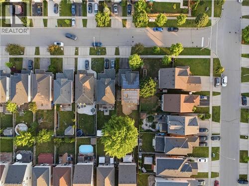 Aerial perspective showcasing residential properties with established landscaping - 128 Houghton Street, Cambridge, ON 