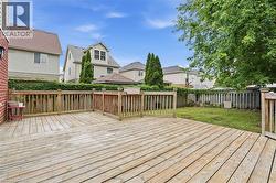 Expansive wood deck with a perimeter railing - 