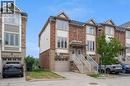Brick and stone veneer facade with gabled dormers - 8 Hemlock Way Unit# 22, Grimsby, ON 