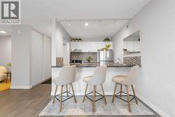 2003, 221 6 Avenue SE  Calgary, AB T2G 4Z9