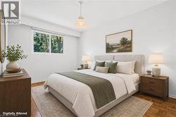 Virtually Staged - Main Floor Primary Bedroom - 