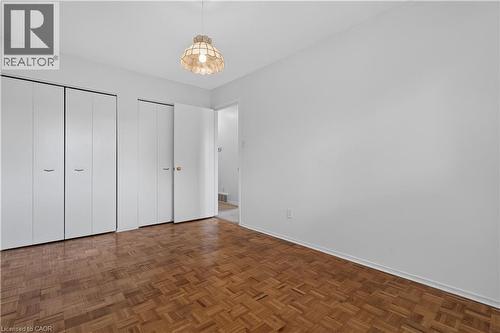 Main Floor Primary Bedroom with double closet - 5051 Brady Avenue, Burlington, ON 