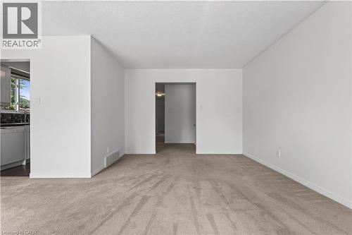 Spacious bright Living Room - 5051 Brady Avenue, Burlington, ON - Indoor Photo Showing Other Room