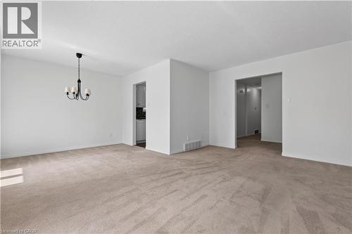 Living Room open to spacious Dining Room - 5051 Brady Avenue, Burlington, ON - Indoor Photo Showing Other Room