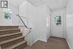 Front hallway and stairs to main level - 