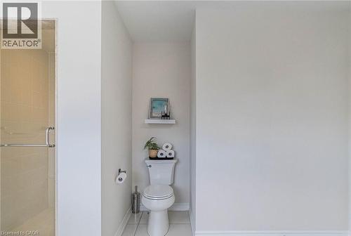 Toilet alcove featuring white walls and a white floor tile - 47 Hawke Crescent, New Tecumseth, ON 