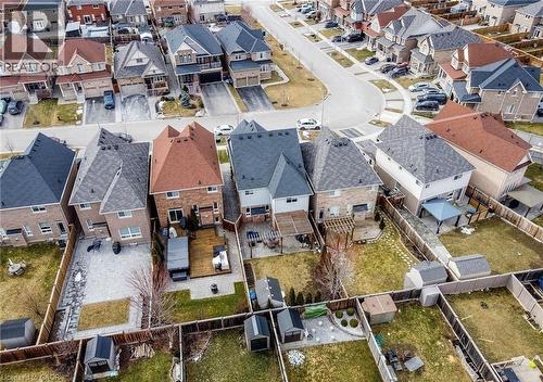 Aerial perspective showcasing a residential street with multiple detached properties - 47 Hawke Crescent, New Tecumseth, ON 