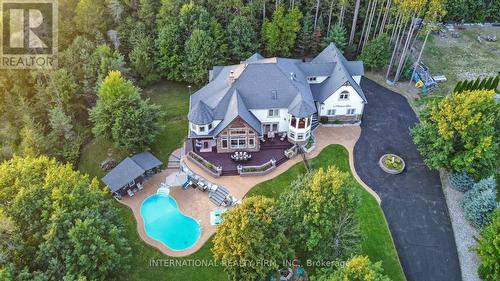 Bird's eye view of this private 1.62-acre oasis. - 6 Pinehurst Lane, Springwater, ON - Outdoor With In Ground Pool With View