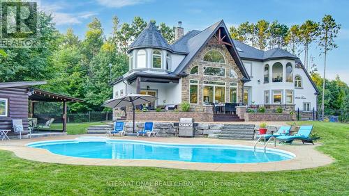 \"Pool Paradise\"-a spectacular backyard oasis. - 6 Pinehurst Lane, Springwater, ON - Outdoor With In Ground Pool