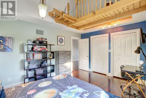 2nd level bedroom with double closets and loft. - 6 Pinehurst Lane, Springwater, ON - Indoor Photo Showing Bedroom