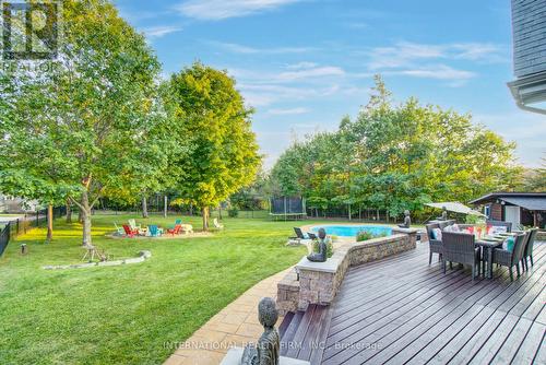Manicured estate grounds framed by mature trees. - 6 Pinehurst Lane, Springwater, ON - Outdoor