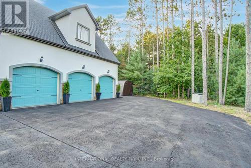 Attached 3-car garage with soaring 14-ft ceilings. - 6 Pinehurst Lane, Springwater, ON - Outdoor