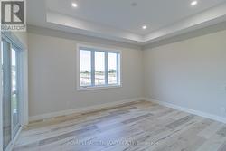 Master showing walk-out door to sun deck on left - 