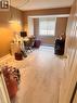 Room featuring light-toned tile flooring and a window with blinds - 17 Hawkswood Drive, Kitchener, ON 