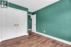 Wood-finish plank flooring throughout - 