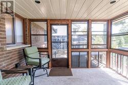 Sun room leads on to the deck. - 