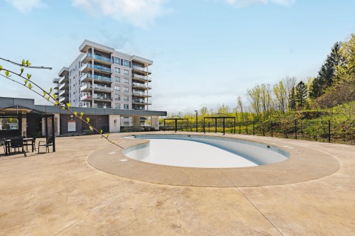 Pool - 304-7755 Boul. St-Martin O., Laval (Sainte-Dorothée), QC - Outdoor With In Ground Pool