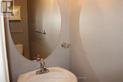 MAIN FLOOR POWDER ROOM - 