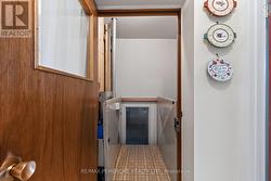 Elevator access to Basement and Garage. - 