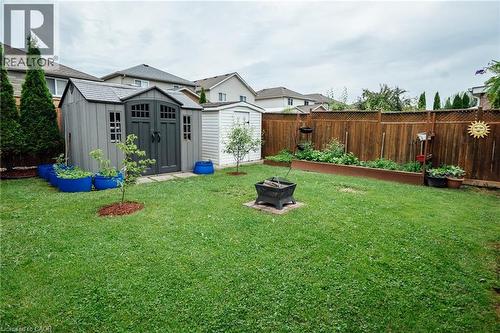 Expansive backyard featuring a manicured lawn - 171 Mcnichol Drive, Cambridge, ON 