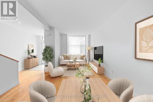 Open concept living and dining virtually staged - 53 Vaughan Street, Ottawa, ON 