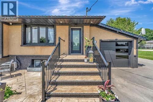 exterior featuring a prominent bay window with dark trim - 192 Myers Road, Cambridge, ON 