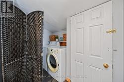 Main floor laundry space. - 