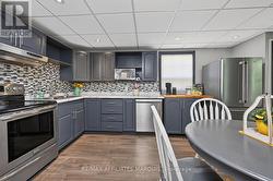 Plenty of cabinets and counter space. - 