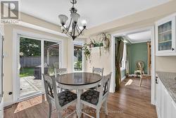 Breakfast area with walkout to deck & backyard - 