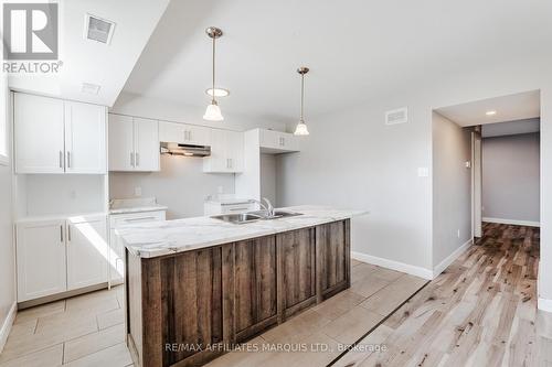 Photo is of lower unit - 2459 Watson Crescent, Cornwall, ON 
