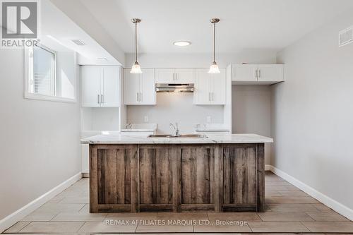 Photo is of lower unit - 2459 Watson Crescent, Cornwall, ON 