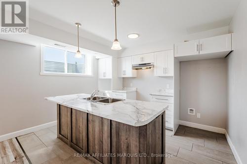 Photo is of lower unit - 2459 Watson Crescent, Cornwall, ON 